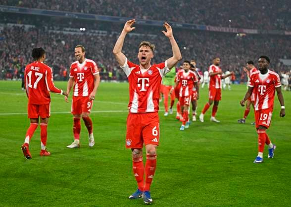 15.04.2026, Fussball UEFA Championsleague 2025 2026: Viertelfinale Rückspiel, FC Bayern München - Real Madrid, in der Allianz-Arena München, Joshua Kimmich (FC Bayern München) freut sich nach dem Spiel. ***DFL and DFB regulations prohibit any use of photographs as image sequences and or quasi-video.*** *** 15 04 2026, Football UEFA Championsleague 2025 2026 quarter-final second leg, FC Bayern Munich Real Madrid, in the Allianz Arena Munich, Joshua Kimmich FC Bayern Munich is happy after the match DFL and DFB regulations prohibit any use of photographs as image sequences and or quasi video
