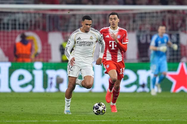 April 15, 2026, Munich, Bavaria, Germany: Trent Alexander-Arnold of Real Madrid CF and Jamal Musiala of Bayern Munich in action during the UEFA Champions League 2025 26 Quarter-Final Second Leg match between FC Bayern MoÂ¼nchen and Real Madrid CF at Allianz Arena on April 15, 2026 in Munich, Germany. Munich Germany - ZUMAa181 20260415_zaa_a181_278 Copyright: xDennisxAgyemanx