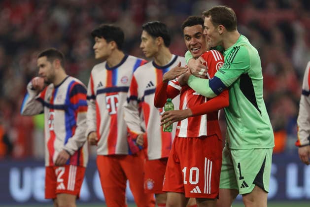 Jamal Musiala FC Bayern Munich and goalkeeper Manuel Neuer FC Bayern Munich celebrate after winning during the UEFA Champions League 2025 26 Quarter Final Second Leg match between FC Bayern Munich and Real Madrid CF at Football Arena Munich on April 15, 2026 in Munich, Germany Photo by Oliver Kaelke DeFodi Images