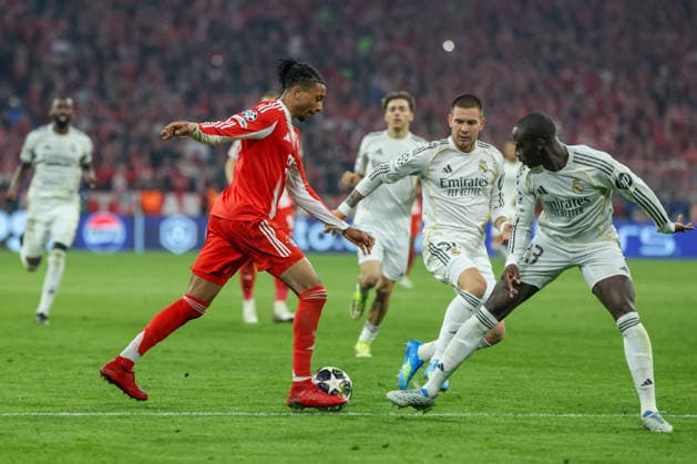 Michael Olise FC Bayern Muenchen, 17 with Ferland Mendy Real Madrid CF, 23 , GER, FC Bayern Muenchen vs Real Madrid CF, Football, UEFA Champions League, quarter-final, second leg, 2025 2026 season, 15 04 2026, GER, FC Bayern Muenchen vs Real Madrid CF, Football, UEFA Champions League, quarter-final, second leg, 2025 2026 season, 15 04 2026 Muenchen Copyright: xEibner-Pressefoto JennixMaulx EP_JML