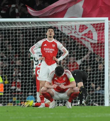 Football - 2025 2026 UEFA Champions League - Quarter-Final, Second Leg: Arsenal (1) vs. Sporting Lisbon (0) - Emirates Stadium - Wednesday 15th April 2026 Exhausted Arsenal players, Kai Havertz and Declan Rice at the final whistle after going through on the away goals rule. 