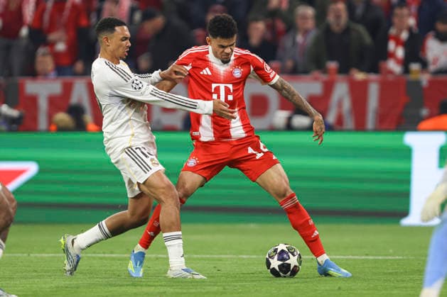 Trent John Alexander Arnold Real Madrid C F and Luis Diaz FC Bayern Munich battle for the ball during the UEFA Champions League 2025 26 Quarter Final Second Leg match between FC Bayern Munich and Real Madrid CF at Football Arena Munich on April 15, 2026 in Munich, Germany Photo by Oliver Kaelke DeFodi Images