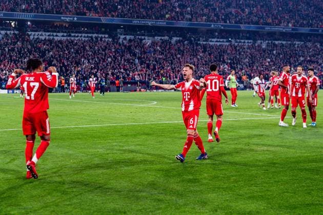 15 04 2026, FC Bayern München vs Real Madrid, UEFA Champions League, quarter-final second leg Joshua Kimmich FC Bayern Muenchen, 6 Celebrating the goal to 4 3 here with Michael Olise FC Bayern Muenchen, 17 Regulations prohibit any use of photographs as image sequences and or quasi video Copyright: xBahhoxKarax
