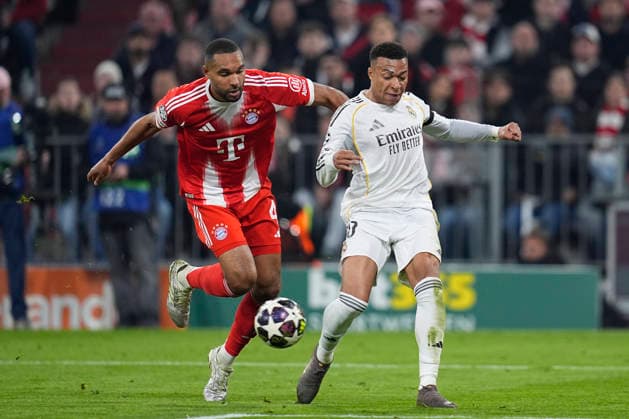 April 15, 2026, Munich, Bavaria, Germany: Kylian Mbappe of Real Madrid CF and Jonathan Tah of Bayern Munich in action during the UEFA Champions League 2025 26 Quarter-Final Second Leg match between FC Bayern MoÂ¼nchen and Real Madrid CF at Allianz Arena on April 15, 2026 in Munich, Germany. FC Bayern Munich V Real Madrid CF - UEFA Champions League 2025 26 Quarter-Final Second Leg  - ZUMAa181 20260415_zaa_a181_282 Copyright: xDennisxAgyemanx