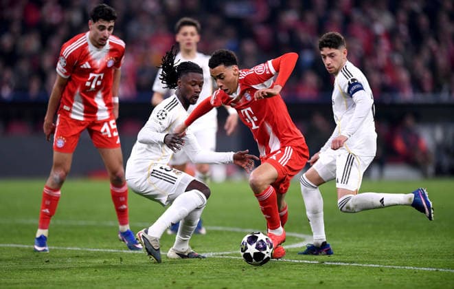 FOOTBALL CHAMPIONS LEAGUE SEASON 2025 2026 Quarter-final second leg 15 04 2026 FC Bayern Muenchen Real Madrid Eduardo Camavinga left, Real Madrid v Jamal Musiala right, FC Bayern Muenchen
