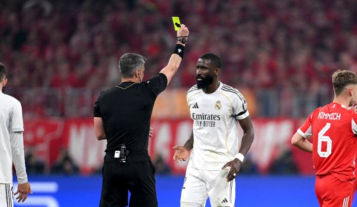 FOOTBALL CHAMPIONS LEAGUE SEASON 2025 2026 Quarter-final second leg 15 04 2026 FC Bayern Munich Real Madrid Referee Slavko Vincic SVN shows yellow card Antonio Ruediger re, Real Madrid