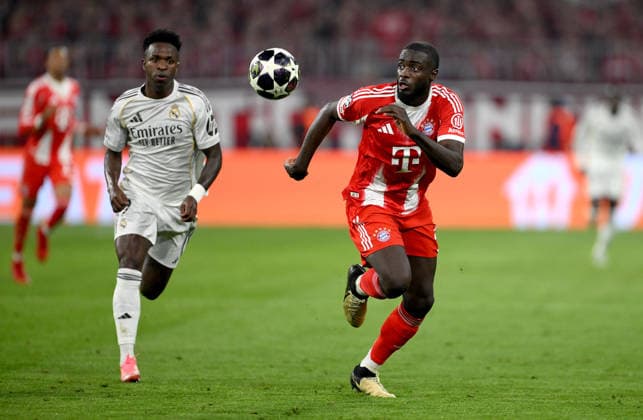 FOOTBALL CHAMPIONS LEAGUE SEASON 2025 2026 Quarter-final second leg 15 04 2026 FC Bayern Muenchen Real Madrid Vinicius Junior left, Real Madrid vs Dayot Upamecano right, FC Bayern Muenchen