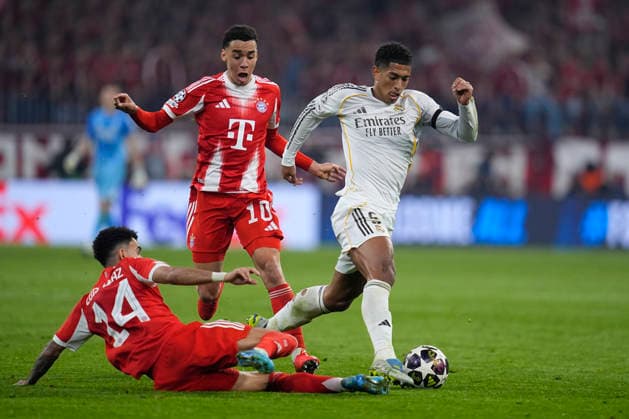 April 15, 2026, Munich, Bavaria, Germany: Jude Bellingham of Real Madrid CF and Luis Diaz of Bayern Munich in action during the UEFA Champions League 2025 26 Quarter-Final Second Leg match between FC Bayern MoÂ¼nchen and Real Madrid CF at Allianz Arena on April 15, 2026 in Munich, Germany. FC Bayern Munich V Real Madrid CF - UEFA Champions League 2025 26 Quarter-Final Second Leg  - ZUMAa181 20260415_zaa_a181_310 Copyright: xDennisxAgyemanx