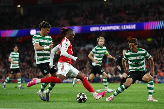 Eberechi Eze of Arsenal with a shot on goal under pressure from Maximiliano Araujo of Sporting CP and Hidemasa Morita of Sporting CP Arsenal v Sporting, UEFA Champions League, Quarter Final, Second Leg, Football, Emirates Stadium, London, UK - 15 Apr 2026London Emirates Stadium United Kingdom EDITORIAL USE ONLY No use with unauthorised audio, video, data, fixture lists, club league logos or live services. Online in-match use limited to 120 images, no video emulation. No use in betting, games or single club league player publications.  Copyright: xSimonxDael Shutterstockx 16828544cu