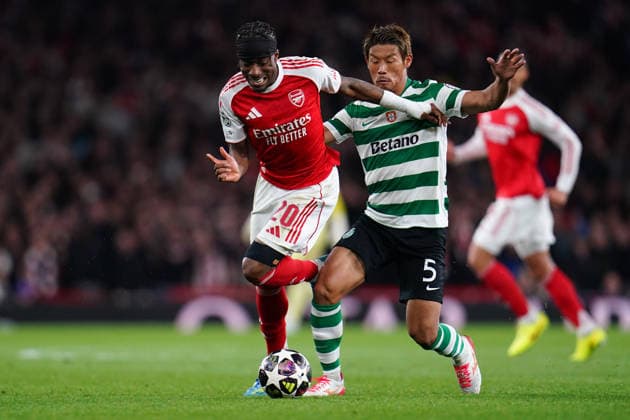 UEFA Champions League Quarter Finals Arsenal v Sporting CP Noni Madueke of Arsenal and Hidemasa Morita of Sporting CP battle during the UEFA Champions League Quarter Finals match Arsenal vs Sporting CP at Arsenal stadium, London, United Kingdom on 15 April 2026 (Photo by Harvey Murphy News Images) Copyright: xHarveyxMurphy NewsxImagesx