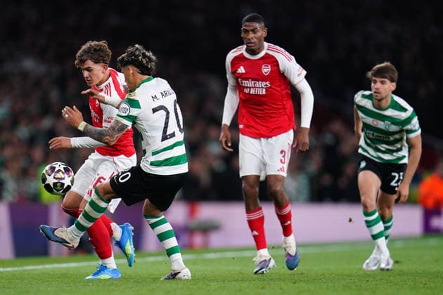 UEFA Champions League Quarter Finals Arsenal v Sporting CP Max Dowman of Arsenal and Maximiliano Araujo of Sporting CP battle for ball during the UEFA Champions League Quarter Finals match Arsenal vs Sporting CP at Arsenal stadium, London, United Kingdom on 15 April 2026 (Photo by Harvey Murphy News Images) Copyright: xHarveyxMurphy NewsxImagesx
