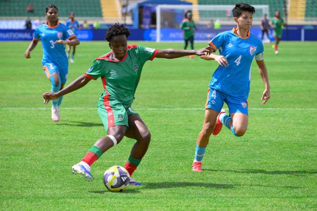 (260416) -- NAIROBI, April 16, 2026 -- Rose Kabzere (L) of Malawi competes during the FIFA Women s Series 2026 football match between Malawi and India in Nyayo National Stadium, Nairobi, Kenya, April 15, 2026. ) (SP)KENYA-NAIROBI-FOOTBALL-FIFA SERIES-INDIA VS MALAWI YangxGuang 