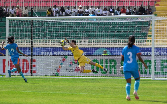 (260416) -- NAIROBI, April 16, 2026 -- Goalkeeper Shreya Hooda (C) of India saves a shot during the FIFA Women s Series 2026 football match between Malawi and India in Nyayo National Stadium, Nairobi, Kenya, April 15, 2026. ) (SP)KENYA-NAIROBI-FOOTBALL-FIFA SERIES-INDIA VS MALAWI YangxGuang 