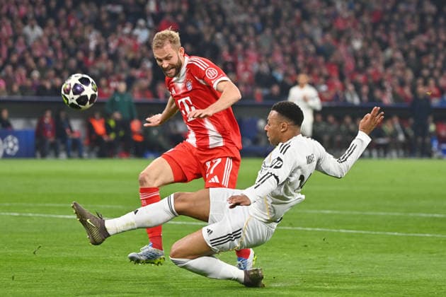 Konrad LAIMER Bayern Muenchen , action,duel against Kylian MBAPPE Real Madrid Football Champions League,season 2025 26, quarter-final FC Bayern Muenchen Real Madrid 4 3 on 15 04 2026 A L L I A N Z A R E N A