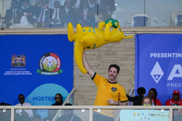 (260416) -- NAIROBI, April 16, 2026 -- A supporter holds a kangaroo inflatable in the stands to cheer for Australia during the FIFA Women s Series 2026 final football match between Australia and Kenya at Nyayo National Stadium in Nairobi, Kenya, on April 15, 2026. ) (SP)KENYA-NAIROBI-FOOTBALL-FIFA SERIES-AUSTRALIA VS KENYA YangxGuang 