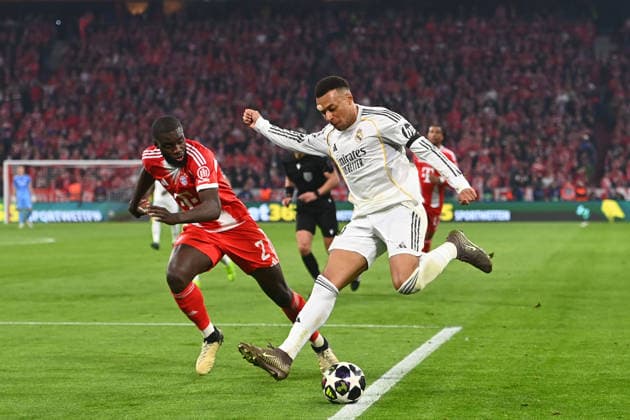 Kylian MBAPPE Real Madrid , action,duel against Dayot UPAMECANO Bayern Muenchen Football Champions League,season 2025 26, quarter-final FC Bayern Muenchen Real Madrid 4 3 on 15 04 2026 A L L I A N Z A R E N A