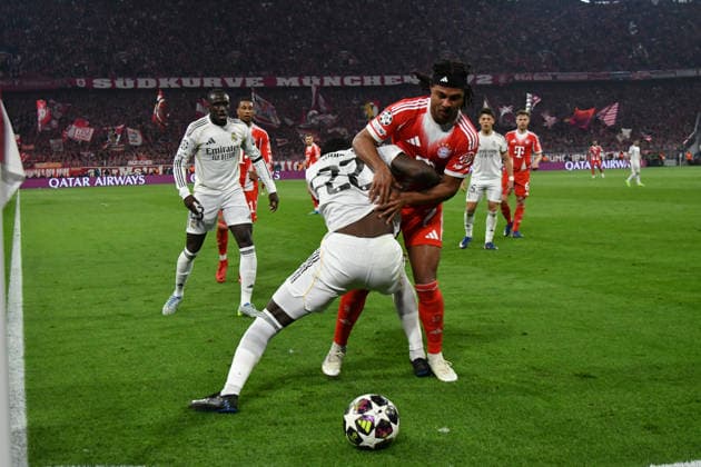 15 04 2026, Allianz Arena, Munich, Champions League, FC Bayern Munich vs Real Madrid , in the picture Antonio Rüdiger Madrid , Serge Gnabry Munich Photo by Midori Ikenouchi Hasan Bratic DeFodi Images