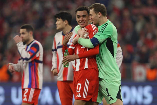 Jamal Musiala FC Bayern Munich and goalkeeper Manuel Neuer FC Bayern Munich celebrate after winning during the UEFA Champions League 2025 26 Quarter Final Second Leg match between FC Bayern Munich and Real Madrid CF at Football Arena Munich on April 15, 2026 in Munich, Germany Photo by Oliver Kaelke DeFodi Images