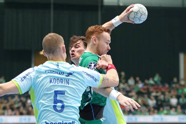 Handball DAIKIN HBL, SC DHfK Leipzig VfL Gummersbach 16 04 2026 Tomas Piroch 7, SC DHfK Leipzig is stopped Handball, DAIKIN HBL, 1 Bundesliga, Season 2025 2026, 21 Matchday Catch-up SC DHfK Leipzig vs VfL Gummersbach on 16 04 2026 at Quarterback Immobilien Arena Leipzig Copyright: xBEAUTIFULxSPORTS JanxKaeferx