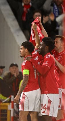 Nottingham, England, 16th April 2026. Morgan Gibbs White of Nottingham Forest celebrates the first goal and holds up a shirt supporting Elliott Anderson after the death of his mother during the Nottingham Forest vs FC Porto UEFA Europa League quarter final 2nd leg match at the City Ground, Nottingham. Picture credit should read: Harriet Massey Sportimage EDITORIAL USE ONLY. No use with unauthorised audio, video, data, fixture lists, club league logos or live services. Online in-match use limited to 120 images, no video emulation. No use in betting, games or single club league player publications. SPI_042_FOREST_V_PORTO SPI-4690-0046