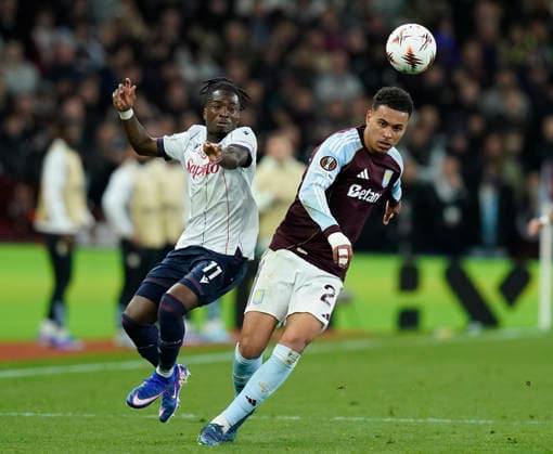 Birmingham, England, 16th April 2026. Bologna s Jonathan Rowe and Morgan Rogers of Aston Villa during the Aston Villa vs Bologna UEFA Europa League quarter final 2nd leg match at Villa Park, Birmingham. Picture credit should read: Andrew Yates Sportimage EDITORIAL USE ONLY. No use with unauthorised audio, video, data, fixture lists, club league logos or live services. Online in-match use limited to 120 images, no video emulation. No use in betting, games or single club league player publications. SPI_048_AY_Villa_Bologna SPI-4689-0048