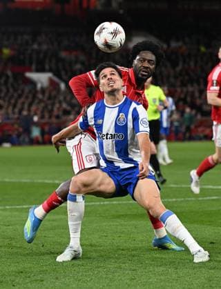 Ola Aina of Nottingham Forest and Francisco Moura of FC Porto Nottingham Forest v Porto, UEFA Europa League, Quarter Final, Second Leg, Football, City Ground, Nottingham, UK - 16 Apr 2026Nottingham City Ground United Kingdom EDITORIAL USE ONLY No use with unauthorised audio, video, data, fixture lists, club league logos or live services. Online in-match use limited to 120 images, no video emulation. No use in betting, games or single club league player publications. Copyright: xAnnaxGowthorpe Shutterstockx 16828681aq