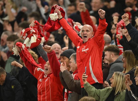 Nottingham, England, 16th April 2026. Nottingham Forest fans celebrate during the Nottingham Forest vs FC Porto UEFA Europa League quarter final 2nd leg match at the City Ground, Nottingham. Picture credit should read: Harriet Massey Sportimage EDITORIAL USE ONLY. No use with unauthorised audio, video, data, fixture lists, club league logos or live services. Online in-match use limited to 120 images, no video emulation. No use in betting, games or single club league player publications. SPI_045_FOREST_V_PORTO SPI-4690-0049