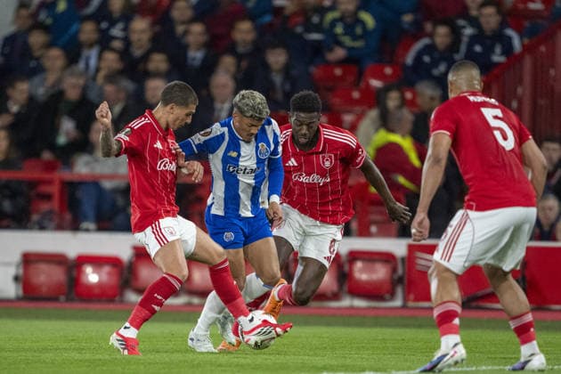 NOTTINGHAM, ENGLAND - APRIL 16: Gabri Veiga of Porto fight for possession with Ibrahim Sangare of Nottingham Forest and Nicolas Dominguez of Nottingham Forest during a UEFA Europa League match between Nottingham Forest and Porto at City Ground on April 16, 2026 in Nottingham, England. (Photo by Pedro Loureiro Sports Press Photo) Copyright: xPedroxLoureiro SportsxPressxPhotox Sportspressphoto_SPR131006