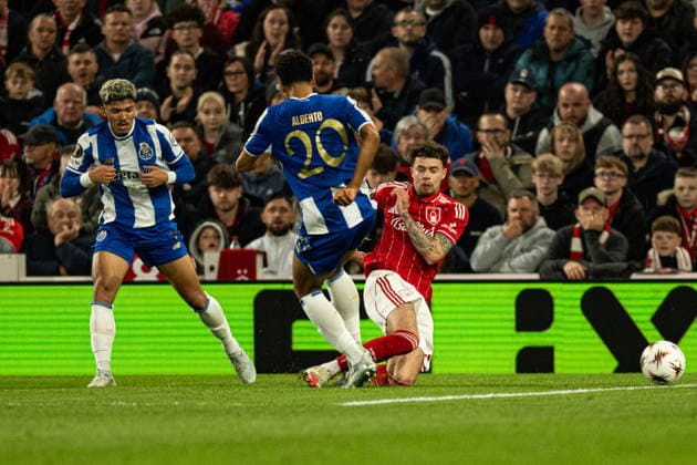 RECORD DATE NOT STATED 16th April 2026; The City Ground, Nottingham, England; UEFA Europa League Football, Nottingham Forest versus Porto; Alberto Costa of FC Porto fouls Neco Williams of Nottingham Forest and gets a yellow card from referee Danny Makkelie (NED) GodfreyxPitt