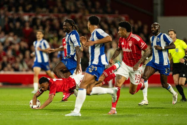 RECORD DATE NOT STATED 16th April 2026; The City Ground, Nottingham, England; UEFA Europa League Football, Nottingham Forest versus Porto; Terem Moffi of FC Porto fouls Dan Ndoye of Nottingham Forest and is booked by referee Danny Makkelie (NED) GodfreyxPitt
