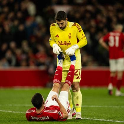 RECORD DATE NOT STATED 16th April 2026; The City Ground, Nottingham, England; UEFA Europa League Football, Nottingham Forest versus Porto; Stefan Ortega helps Jair Cunha of Nottingham Forest with his cramp GodfreyxPitt