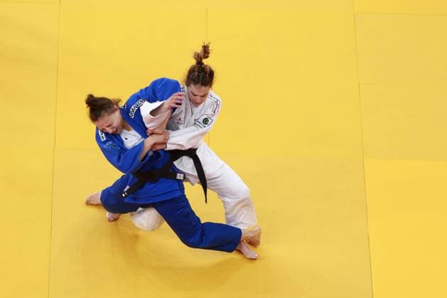 Mina Libeer of Belgium (blue) competes against Ana Viktorija Puljiz of Croatia during a round 32 fight in the Women -57kg, at the European Championships judo in Tbilisi, Georgia, on Friday 17 April 2026. NIKOLAxKRISTC  x171099150x