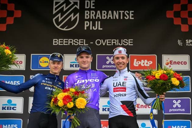 Belgian Quinten Hermans of Pinarello Q36.5 Pro Cycling Team, Danish Anders Foldager of Team Jayco-AIUIa and French Benoit Cosnefroy of UAE Team Emirates-XRG pictured on the podium after the men s Brabantse Pijl one day cycling race, 162,6km from Huizingen, Beersel to Overijse on Friday 17 April 2026. DAVIDxPINTENS  x171144305x