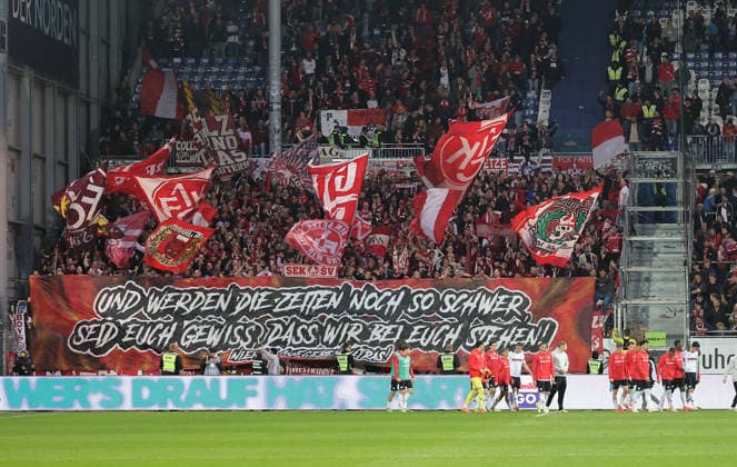 Choreo of the fans from Kaiserslautern after the final whistle Football, Men, Season 2025 2026, 2 BL, Holstein Stadion, Holstein Kiel vs 1 FC Kaiserslautern, 3 0 DFL REGULATIONS PROHIBIT ANY USE OF PHOTOGRAPHS AS IMAGE SEQUENCES AND OR QUASI VIDEO