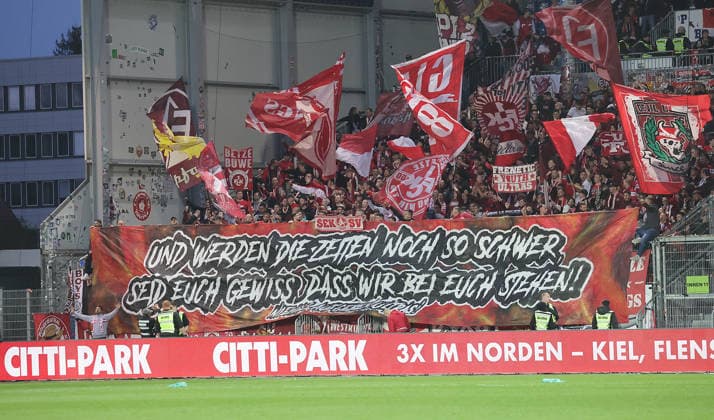 Choreo of the fans from Kaiserslautern after the final whistle Football, Men, Season 2025 2026, 2 BL, Holstein Stadion, Holstein Kiel vs 1 FC Kaiserslautern, 3 0 DFL REGULATIONS PROHIBIT ANY USE OF PHOTOGRAPHS AS IMAGE SEQUENCES AND OR QUASI VIDEO
