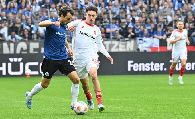 18 04 2026 Soccer Season 2025 2026 2 Soccer Bundesliga 30 Matchday DSC Arminia Bielefeld 1 FC Nuremberg FCN Club Sportfoto Zink xwoxzix DFL regulations prohibit any use of photographs as image sequences and or quasi video only for editorial use Christopher Lannert 24, Arminia Bielefeld Javier Fernandez 20, 1 FC Nuremberg FCN