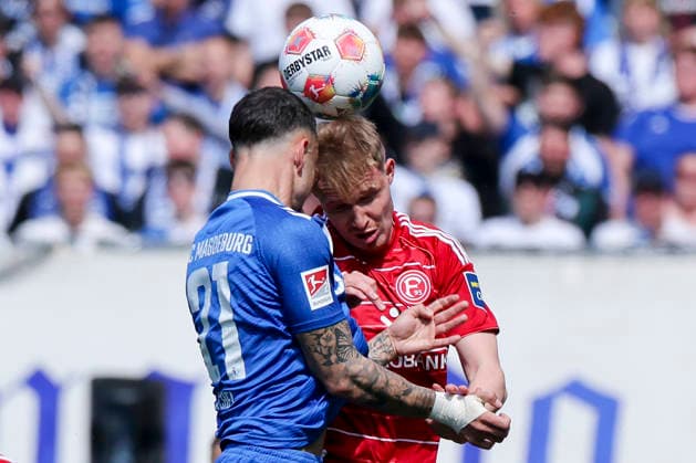 Sport Bilder des Tages Falko Michel (1. FC Magdeburg) und Tim Breithaupt (Fortuna Duesseldorf) kaempfen um den Ball, 2. Bundesliga, 1. FC Magdeburg v Fortuna Düsseldorf, Avnet Arena am 18. April 2026 in Magdeburg, Deutschland. (Foto von Marco Steinbrenner DeFodi Images) Falko Michel (1. FC Magdeburg) und Tim Breithaupt (Fortuna Duesseldorf) battle for the ball, 2. Bundesliga, 1. FC Magdeburg v Fortuna Düsseldorf, Avnet Arena, April 18, 2026 in Magdeburg, Germany. (Photo by Marco Steinbrenner DeFodi Images) -