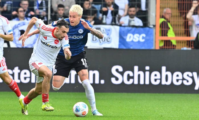 18 04 2026 Soccer Season 2025 2026 2 Soccer Bundesliga 30 Matchday DSC Arminia Bielefeld 1 FC Nürnberg FCN Club Sportfoto Zink xwoxzix DFL regulations prohibit any use of photographs as image sequences and or quasi video only for editorial use Berkay Yilmaz 21, 1 FC Nürnberg FCN Joel Grodowski 11, Arminia Bielefeld