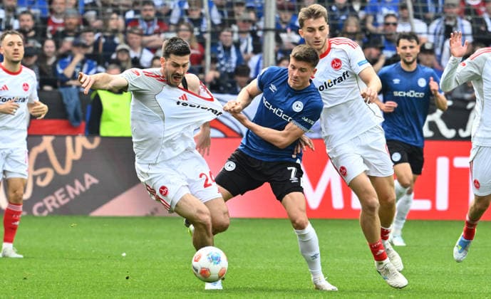 18 04 2026 Soccer Season 2025 2026 2 Soccer Bundesliga 30 Matchday DSC Arminia Bielefeld 1 FC Nürnberg FCN Club Sportfoto Zink xwoxzix DFL regulations prohibit any use of photographs as image sequences and or quasi video only for editorial use Luka Lochoshvili 24, 1 FC Nürnberg FCN Semir Telalovic 7, Arminia Bielefeld Adam Markhiev 6, 1 FC Nürnberg FCN