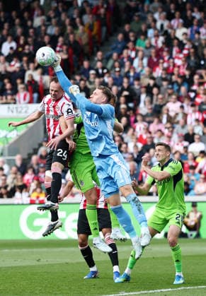 London, England, 18th April 2026. Mikkel Damsgaard of Brentford with Bernd Leno of Fulham during the Brentford vs Fulham Premier League match at Gtech Community Stadium, London. Picture credit should read: David Klein Sportimage EDITORIAL USE ONLY. No use with unauthorised audio, video, data, fixture lists, club league logos or live services. Online in-match use limited to 120 images, no video emulation. No use in betting, games or single club league player publications. SPI_DK_016_Brentford_Fulham SPI-4698-0016