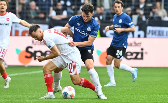 18 04 2026 Soccer Season 2025 2026 2 Soccer Bundesliga 30 Matchday DSC Arminia Bielefeld 1 FC Nürnberg FCN Club Sportfoto Zink xwoxzix DFL regulations prohibit any use of photographs as image sequences and or quasi video only for editorial use Julian Justvan 10, 1 FC Nürnberg FCN Maximilian Bauer 5, Arminia Bielefeld