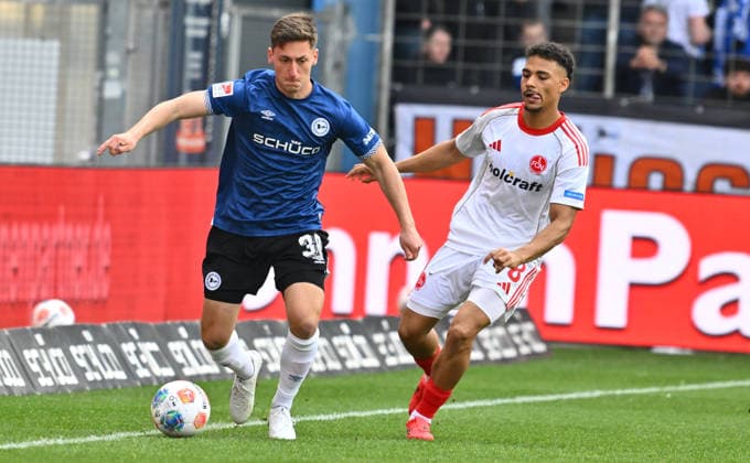 18 04 2026 Soccer Season 2025 2026 2 Soccer Bundesliga 30 Matchday DSC Arminia Bielefeld 1 FC Nürnberg FCN Club Sportfoto Zink xwoxzix DFL regulations prohibit any use of photographs as image sequences and or quasi video only for editorial use Marius Wörl Woerl 38, Arminia Bielefeld Henri Koudossou 8, 1 FC Nürnberg FCN