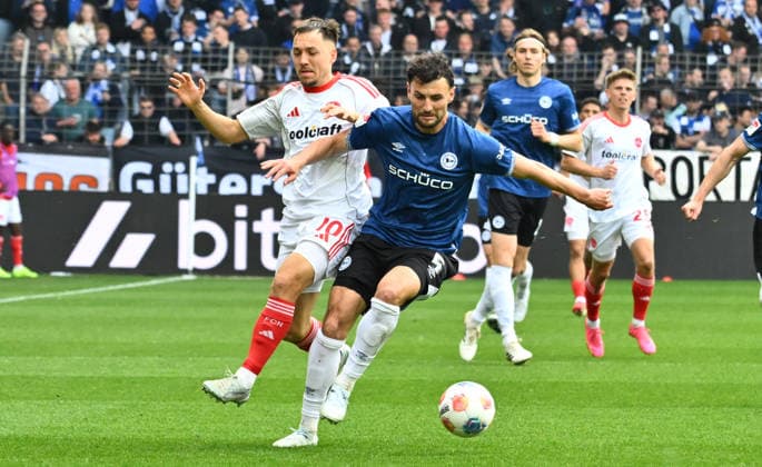 18 04 2026 Soccer Season 2025 2026 2 Soccer Bundesliga 30 Matchday DSC Arminia Bielefeld 1 FC Nürnberg FCN Club Sportfoto Zink xwoxzix DFL regulations prohibit any use of photographs as image sequences and or quasi video only for editorial use Julian Justvan 10, 1 FC Nürnberg FCN Maximilian Bauer 5, Arminia Bielefeld