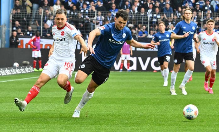 18 04 2026 Soccer Season 2025 2026 2 Soccer Bundesliga 30 Matchday DSC Arminia Bielefeld 1 FC Nürnberg FCN Club Sportfoto Zink xwoxzix DFL regulations prohibit any use of photographs as image sequences and or quasi video only for editorial use Julian Justvan 10, 1 FC Nürnberg FCN Maximilian Bauer 5, Arminia Bielefeld