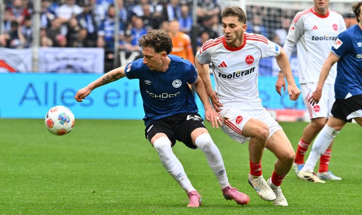 18 04 2026 Soccer Season 2025 2026 2 Soccer Bundesliga 30 Matchday DSC Arminia Bielefeld 1 FC Nuremberg FCN Club Sportfoto Zink xwoxzix DFL regulations prohibit any use of photographs as image sequences and or quasi video only for editorial use Jannik Rochelt 22, Arminia Bielefeld Adam Markhiev 6, 1 FC Nuremberg FCN