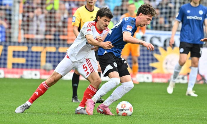 18 04 2026 Soccer Season 2025 2026 2 Soccer Bundesliga 30 Matchday DSC Arminia Bielefeld 1 FC Nürnberg FCN Club Sportfoto Zink xwoxzix DFL regulations prohibit any use of photographs as image sequences and or quasi video only for editorial use Tom Baack 5, 1 FC Nürnberg FCN Jannik Rochelt 22, Arminia Bielefeld