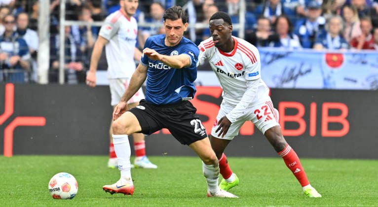 18 04 2026 Soccer Season 2025 2026 2 Soccer Bundesliga 30 Matchday DSC Arminia Bielefeld 1 FC Nuremberg FCN Club Sportfoto Zink xwoxzix DFL regulations prohibit any use of photographs as image sequences and or quasi video only for editorial use Stefano Russo 21, Arminia Bielefeld Rabby Nzingoula 22, 1 FC Nuremberg FCN