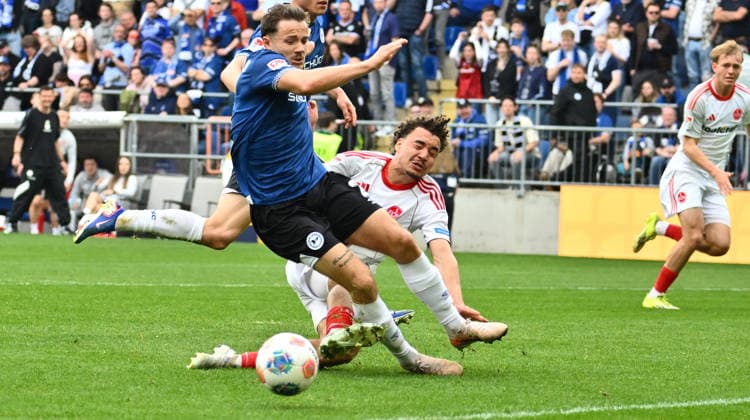 18 04 2026 Soccer Season 2025 2026 2 Soccer Bundesliga 30 Matchday DSC Arminia Bielefeld 1 FC Nürnberg FCN Club Sportfoto Zink xwoxzix DFL regulations prohibit any use of photographs as image sequences and or quasi video only for editorial use Felix Hagmann 2, Arminia Bielefeld Rafael Lubach 18, 1 FC Nürnberg FCN