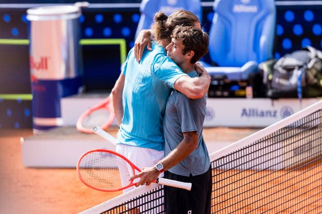 MUNICH, GERMANY - APRIL 18: Alexander Zverev (GER) and Flavio Cobolli (ITA) hug after the BMW Open by Bitpanda Singles match between Alexander Zverev (GER) vs Flavio Cobolli (ITA) at MTTC Iphitos on April 18, 2026 in Munich, Germany. Bavaria Germany Copyright: xSteffiexWunderlx