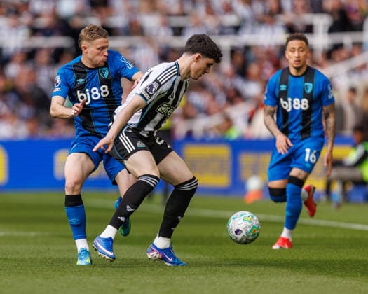18th April 2026; St James Park, Newcastle, England; Premier League Football, Newcastle United versus Bournemouth; Adrien Truffert of Bournemouth challenges Tino Livramento of Newcastle United WMxSportsxMedia